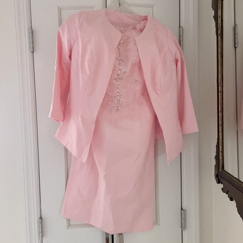 Pink sequenced party dress.